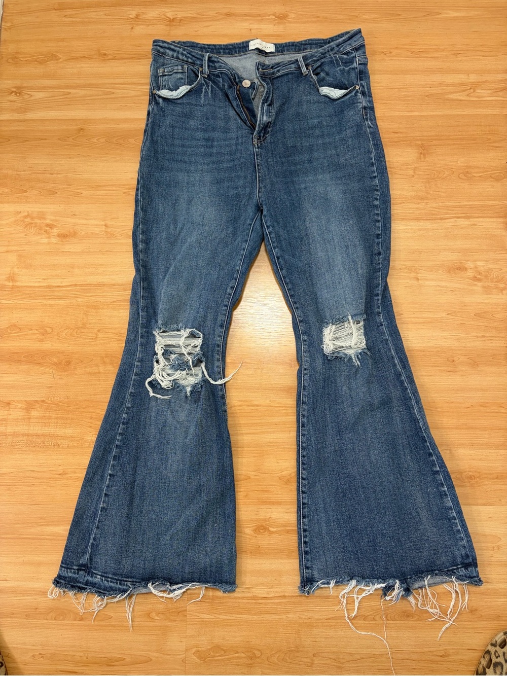 Distressed Flare Jeans in Dark Blue